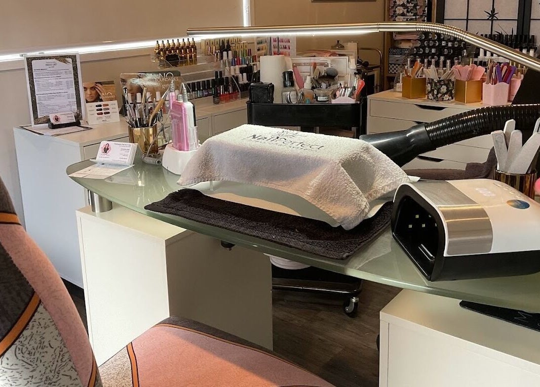 Nail care station at Champagne Nails NZ, Rotorua, Bay Of Plenty, NZ featuring tools and products.