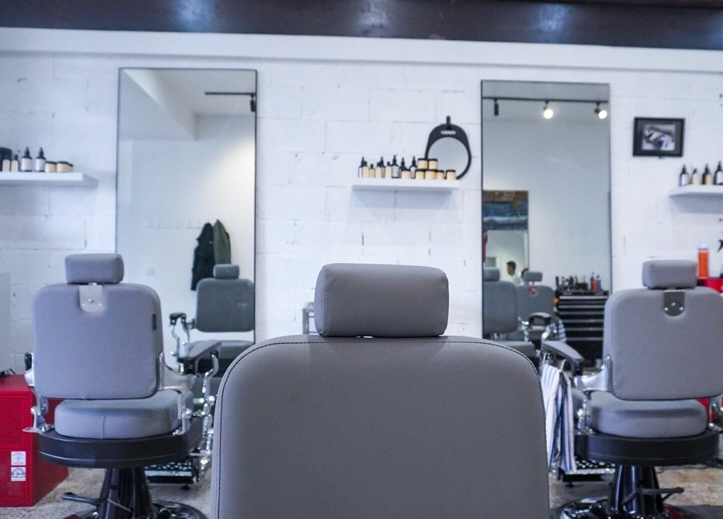 Modern interior of Be Good Studio with stylish chairs and mirrors, located in Melbourne, Victoria, AU.