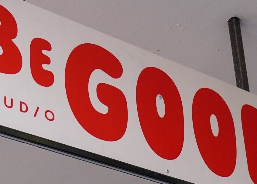 Be Good Studio entrance sign with bold red letters in Melbourne, Victoria, AU.