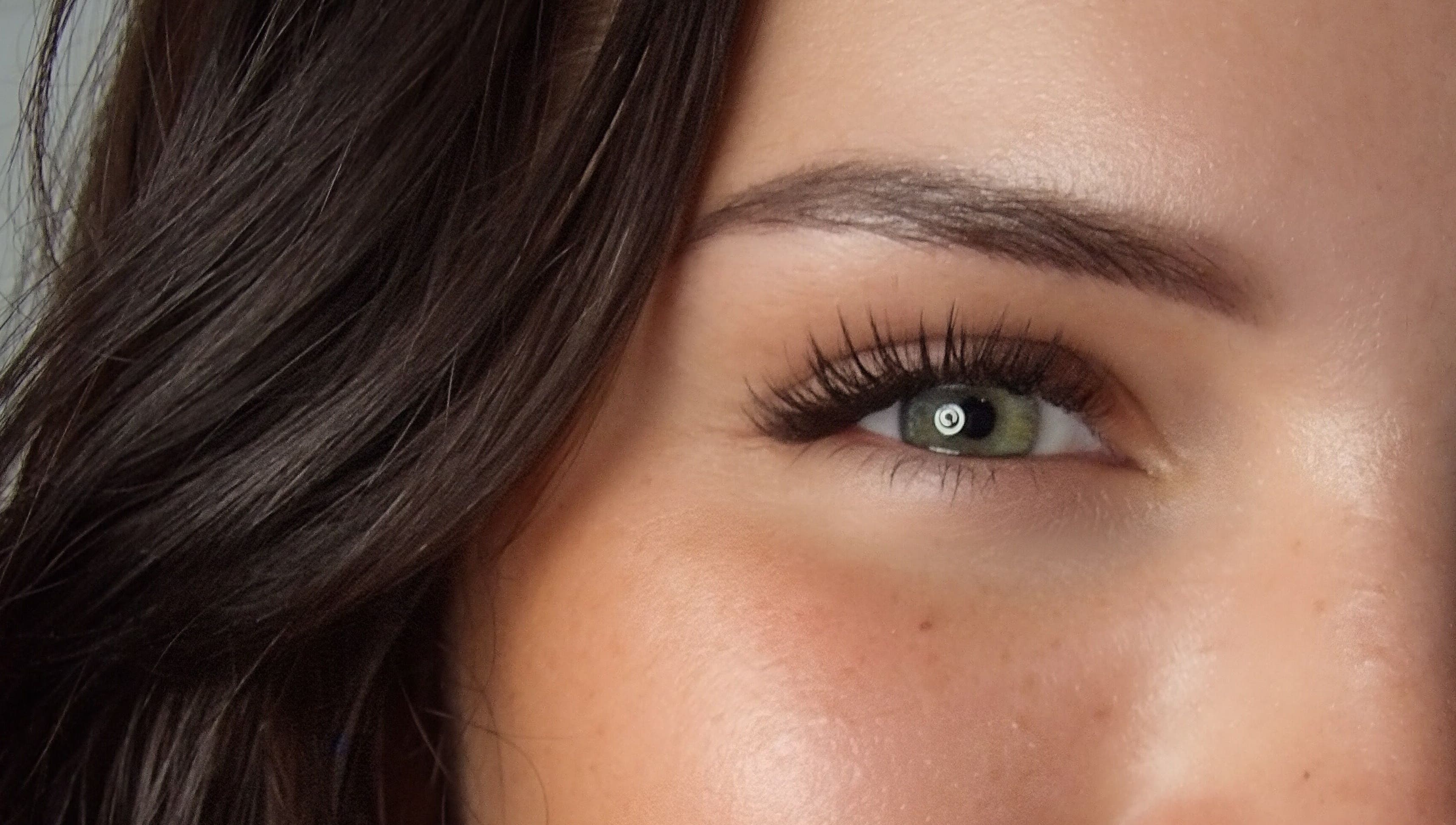 Expert eyelash extensions at Élique Lash + Brow Studio, Randburg, Gauteng, ZA, showcasing natural beauty.