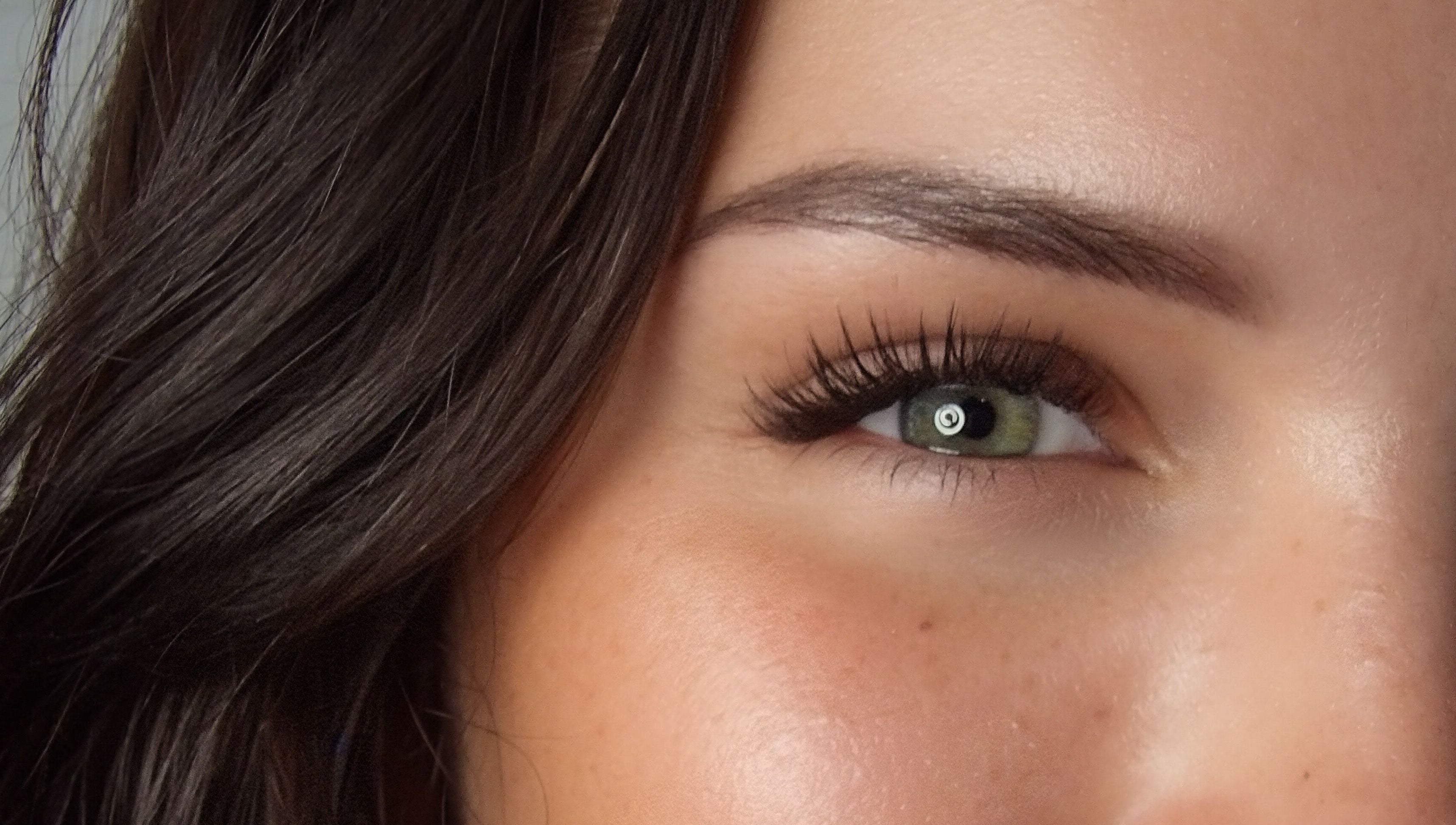 Expert eyelash extensions at Élique Lash + Brow Studio, Randburg, Gauteng, ZA, showcasing natural beauty.