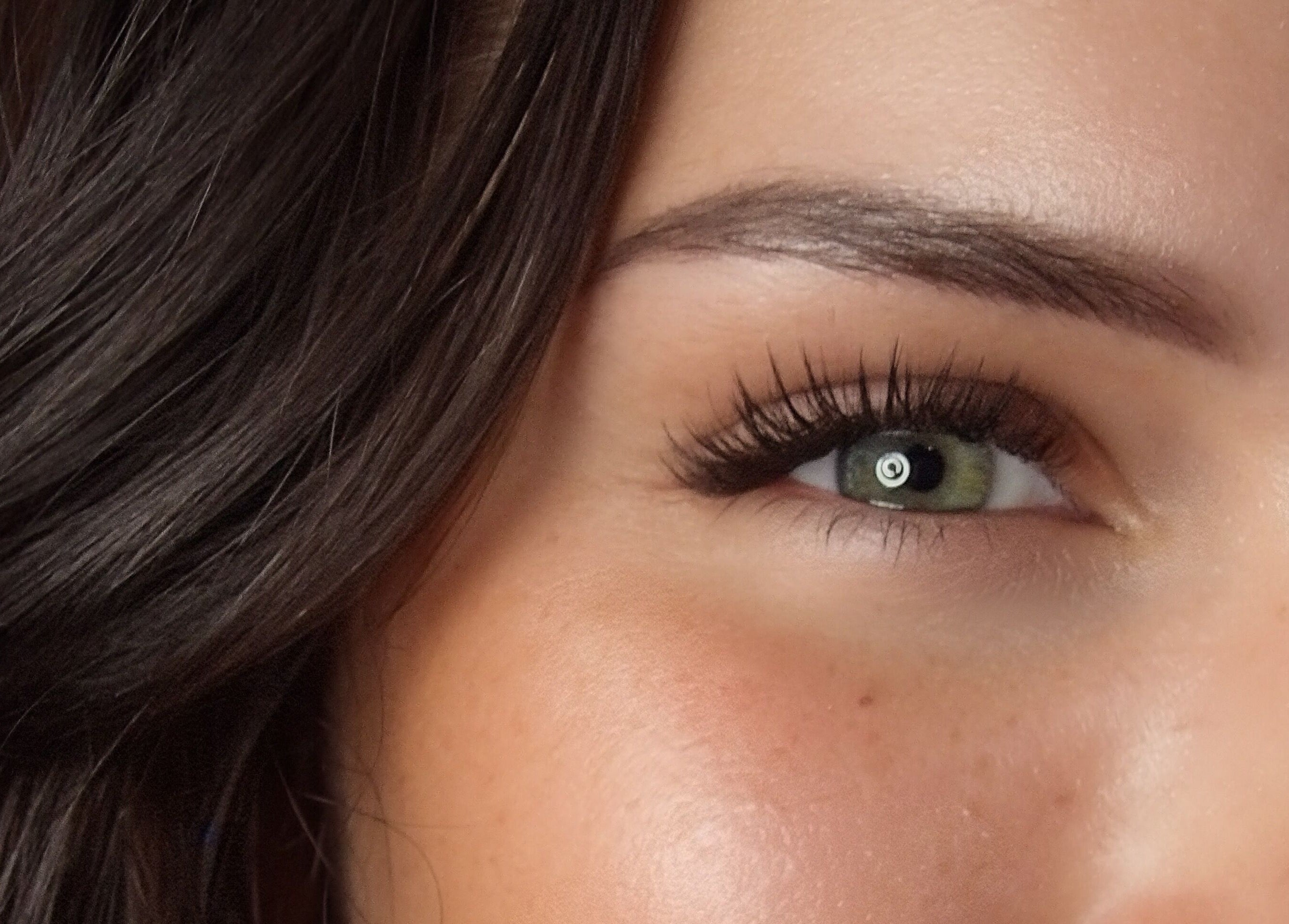 Expert eyelash extensions at Élique Lash + Brow Studio, Randburg, Gauteng, ZA, showcasing natural beauty.