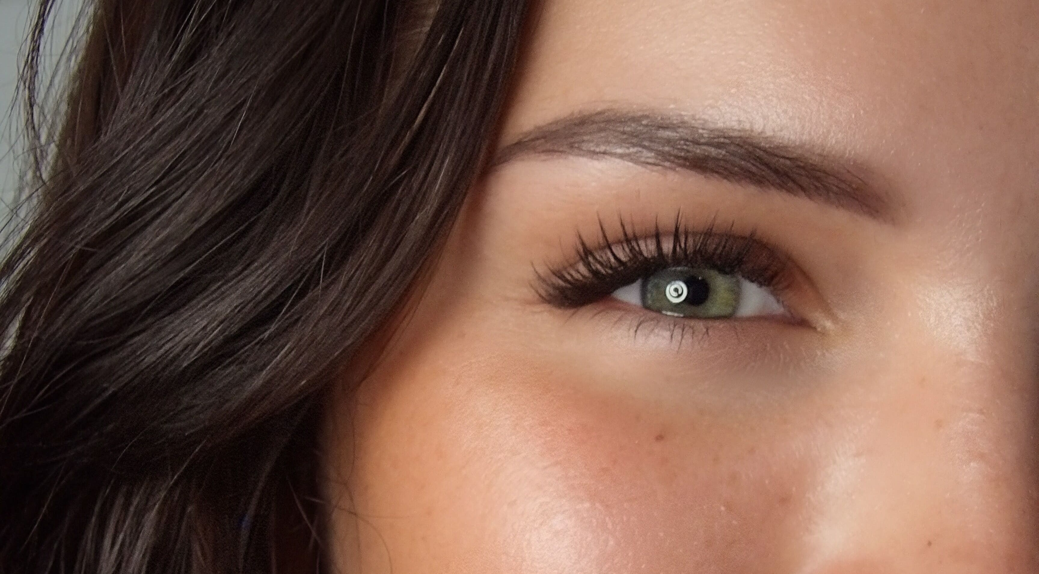 Expert eyelash extensions at Élique Lash + Brow Studio, Randburg, Gauteng, ZA, showcasing natural beauty.