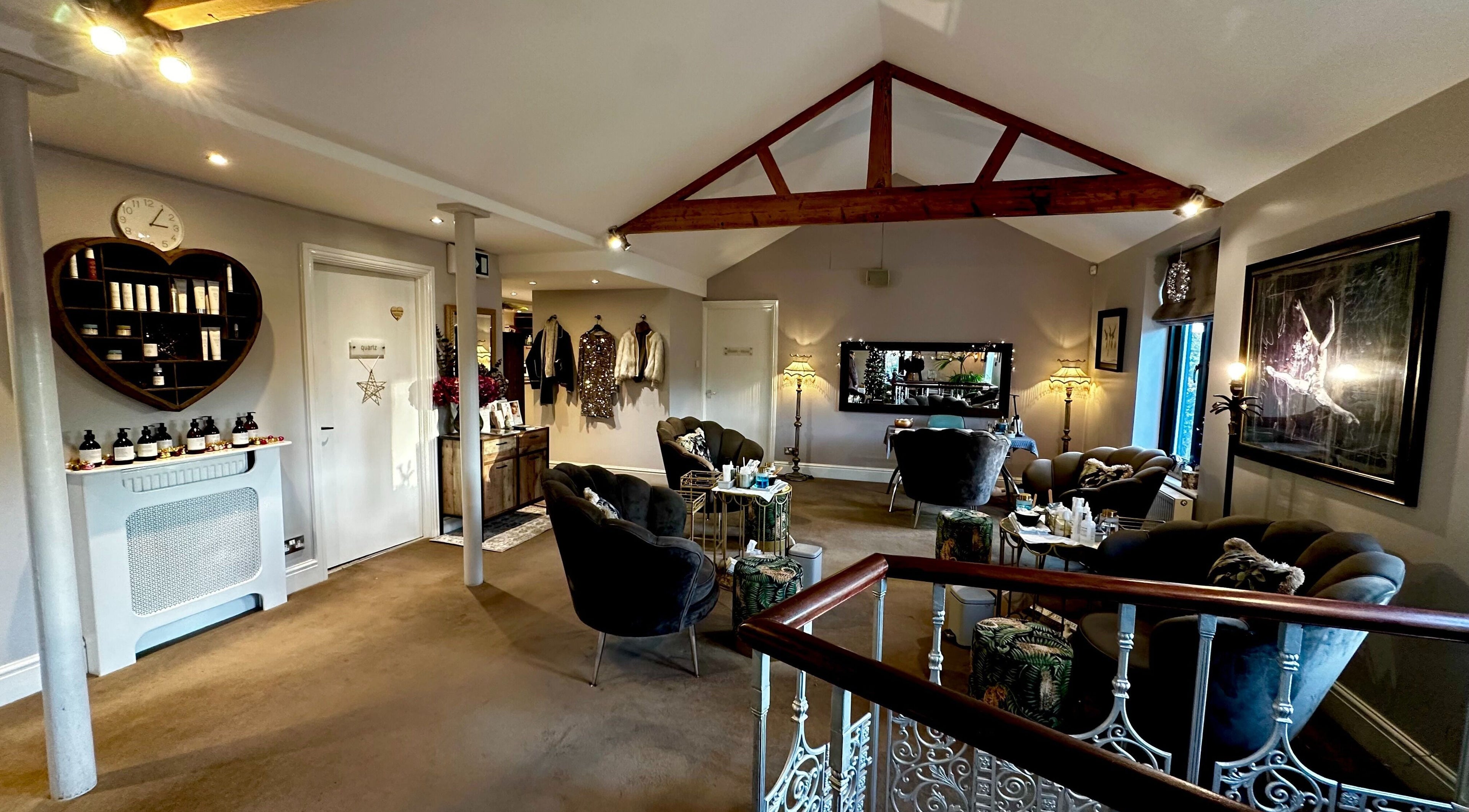 Relax in stylish comfort at Esse Boutique, Day Spa, Cafe & Studio in Royston, England, GB with elegant seating and decor.