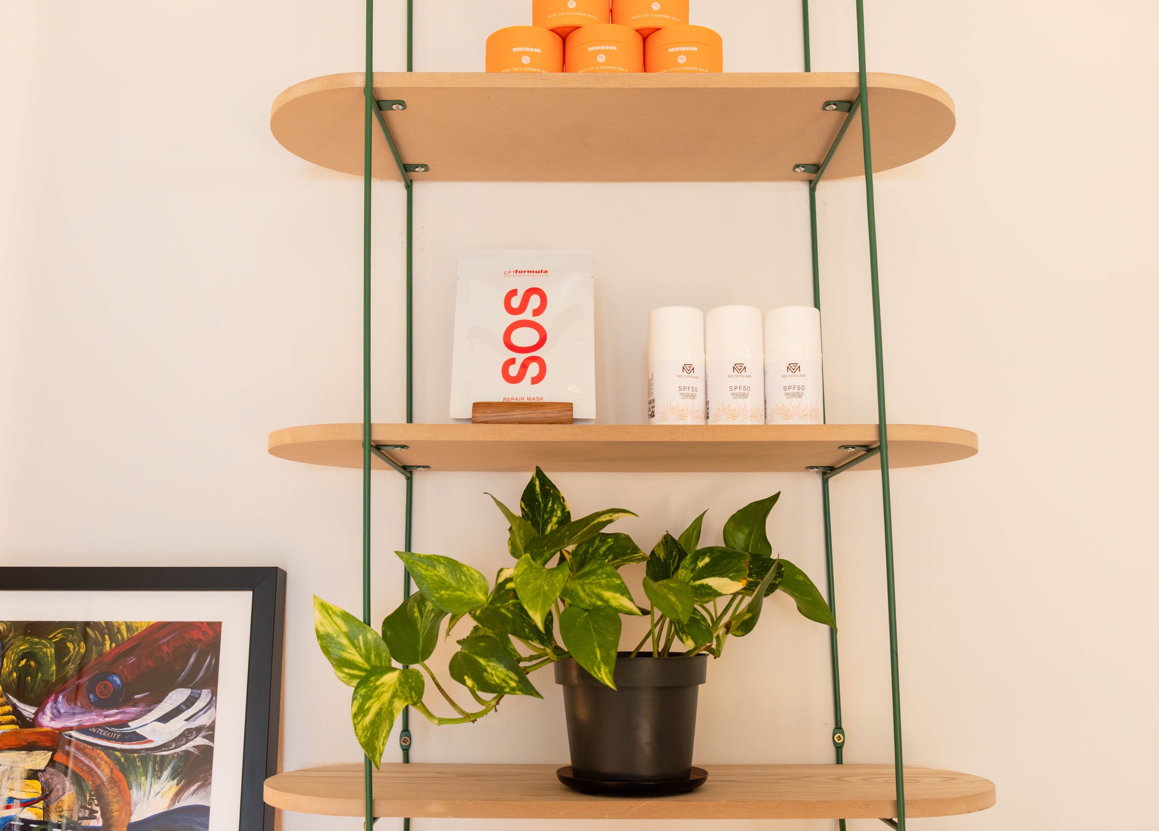 Modern shelf with beauty products and plant at O!GLOW-ON: byAudrey.ldn, London, England, GB.
