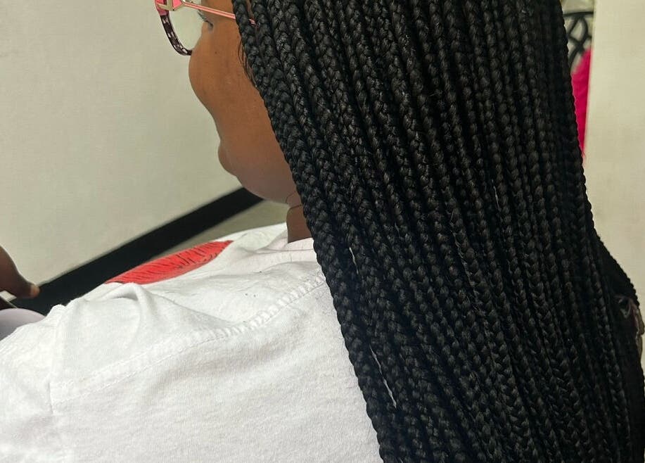 Intricate braids at Braid Couturee in Bridgetown, Saint Michael, BB showcase stunning hairstyling expertise.