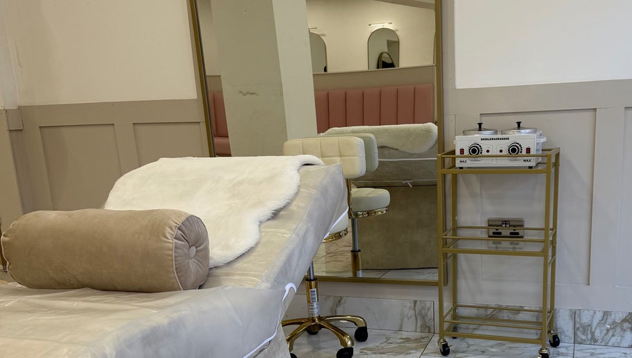 Luxurious spa bed and wax station at By Brown, Hetton-le-hole, England, GB, offering serene beauty treatments.