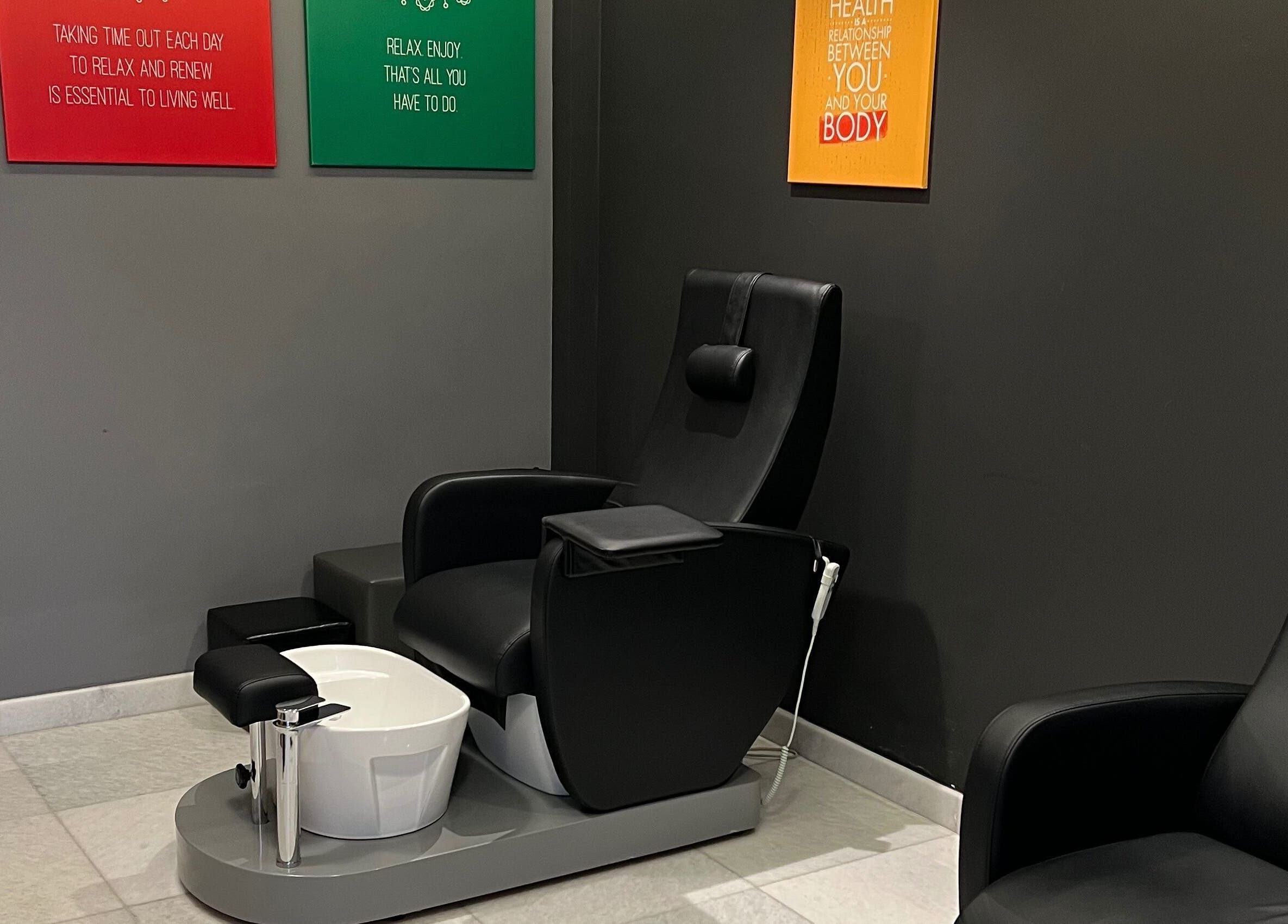 Relaxing pedicure station at The Backyard Spa Alkhoudh, Sib, Muscat Governorate, OM featuring comfortable seating.