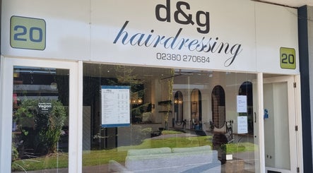 Exterior view of D&G Hairdressing in Chandler's Ford, England, GB showcasing its inviting glass storefront.