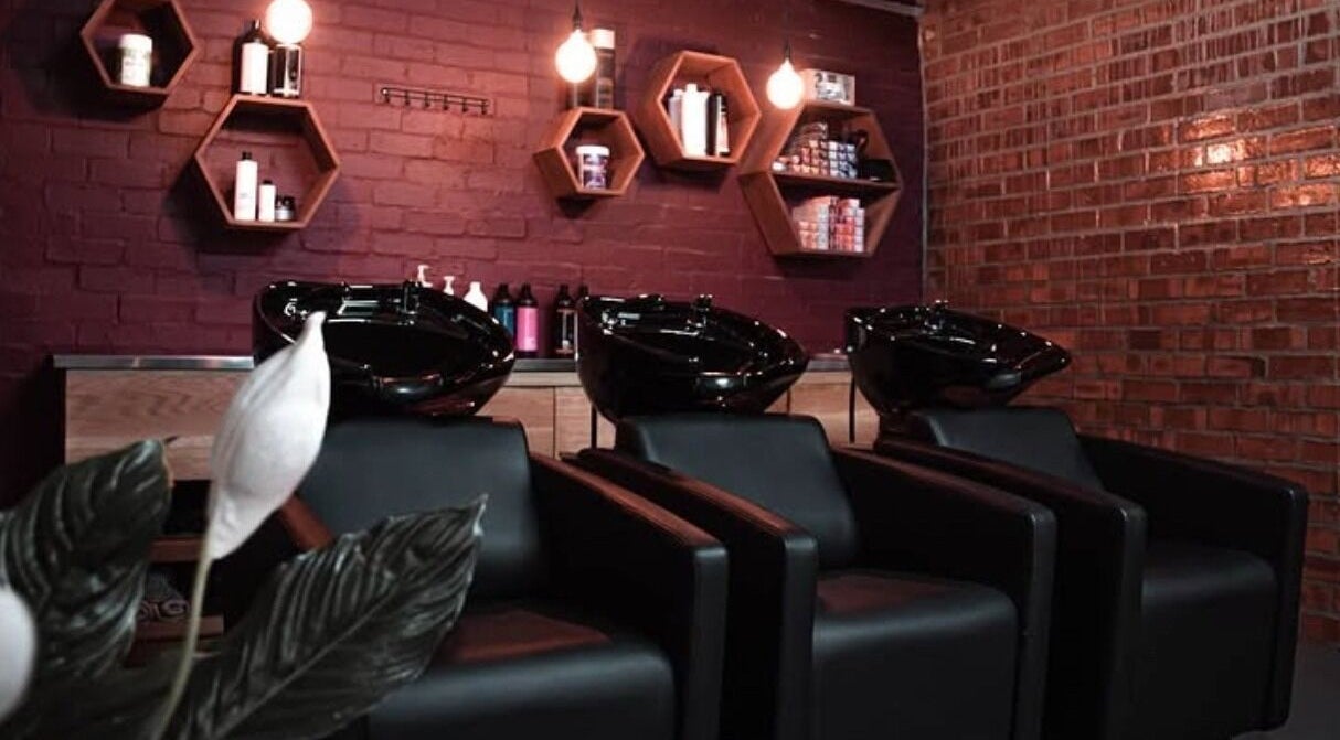 Elegant wash stations at Blunt Hair Studio, Stellenbosch, Western Cape, ZA, featuring modern decor.