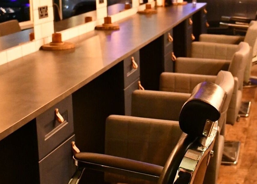 Modern salon interior with stylish chairs at Claire @ Vollood, Dunfermline, Scotland, GB.