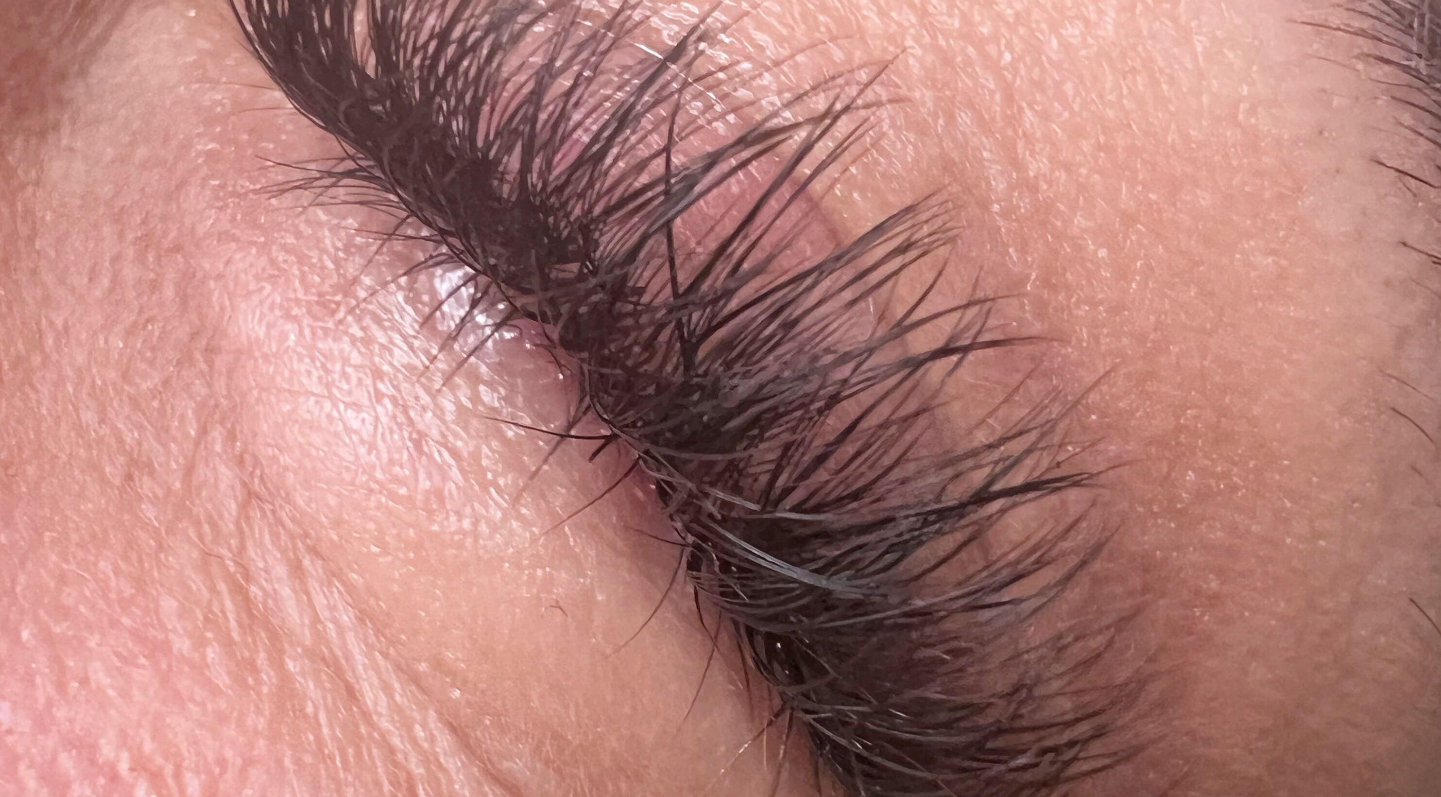 Close-up of lush, natural eyelashes at Berry Boutique, Epsom, England, GB, showcasing beauty expertise.