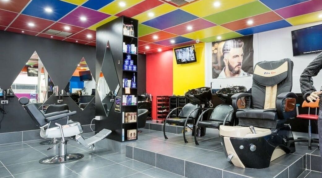 Colorful interior of Family Hair & Beauty Salon in Granville, New South Wales, AU featuring salon chairs and mirrors.