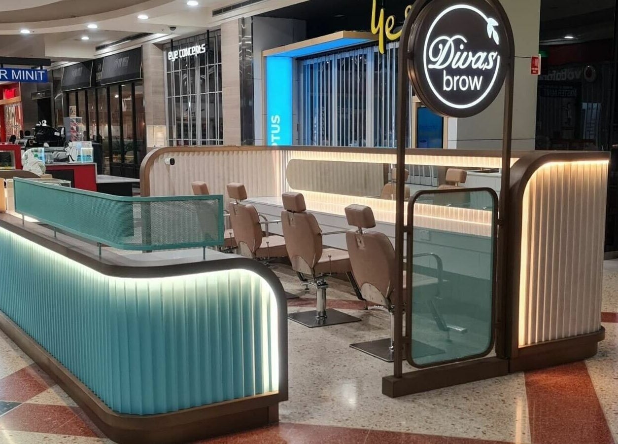Divas Brow | Erina Fair salon setup with sleek seating in Erina, New South Wales, AU mall.