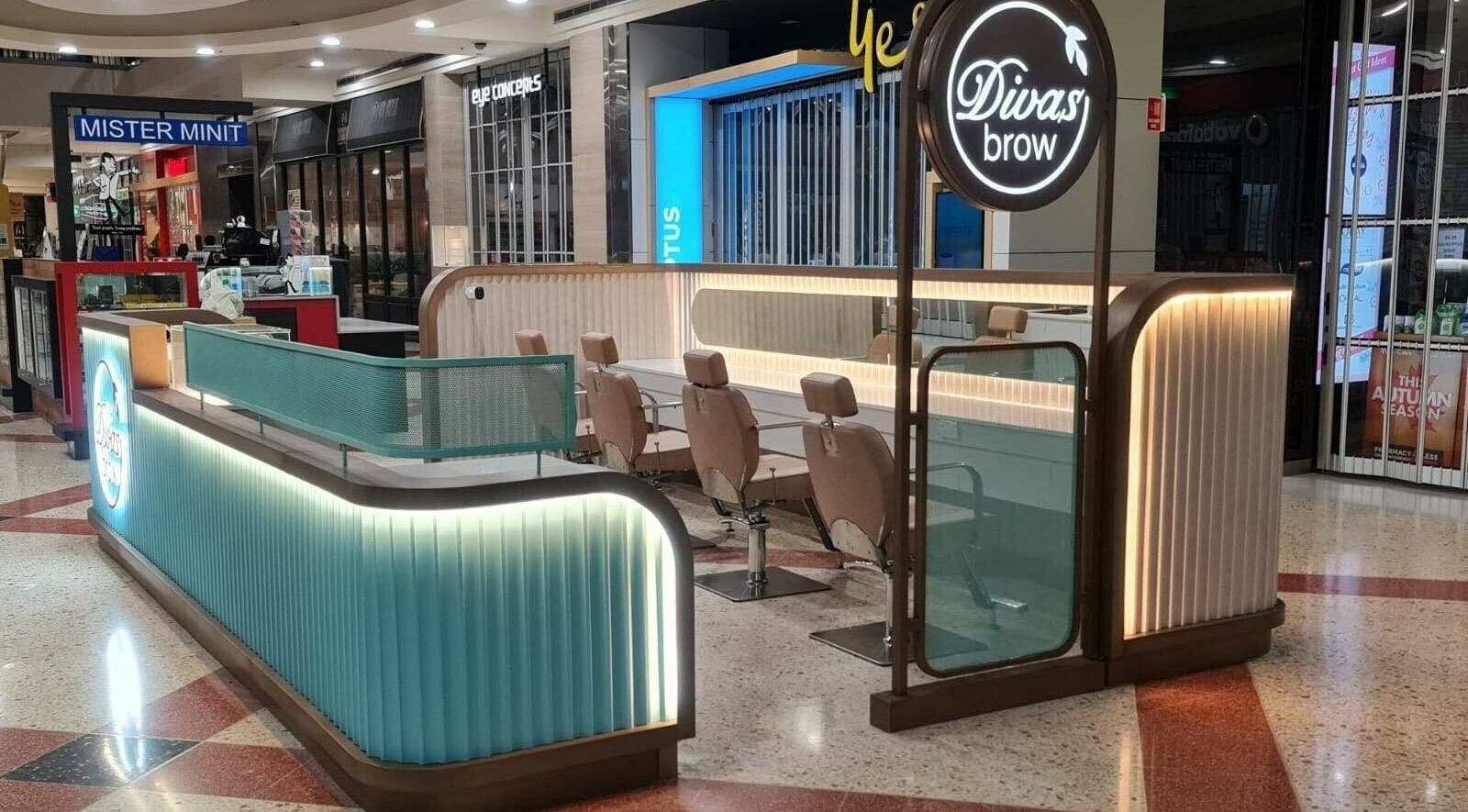 Divas Brow | Erina Fair salon setup with sleek seating in Erina, New South Wales, AU mall.