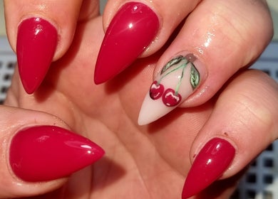 Stylish cherry nail art in bright red at Beautello, Polokwane, Limpopo, ZA.