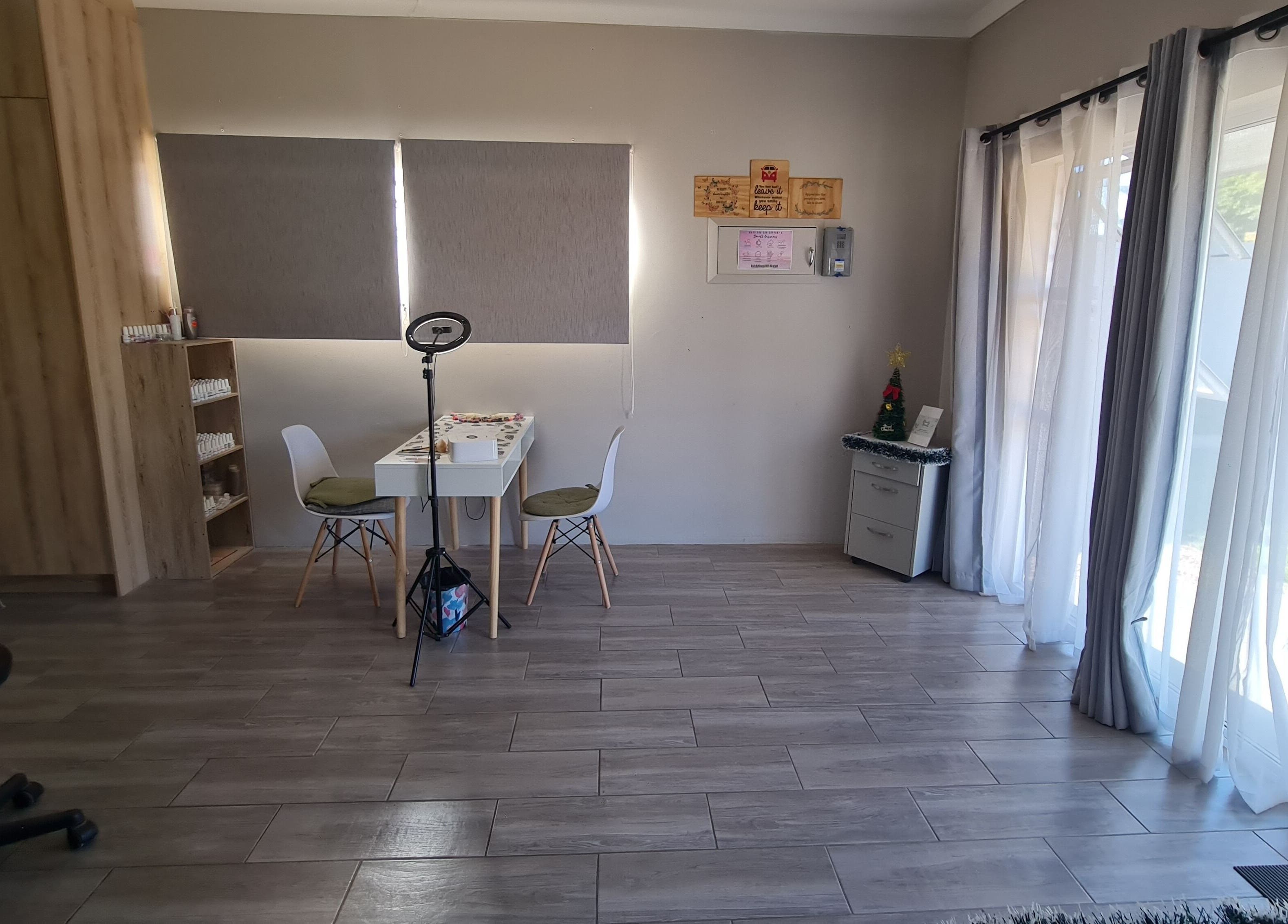 Bright beauty studio at Beauty Secrets, Jeffreys Bay, Eastern Cape, ZA, with elegant decor and ample natural light.