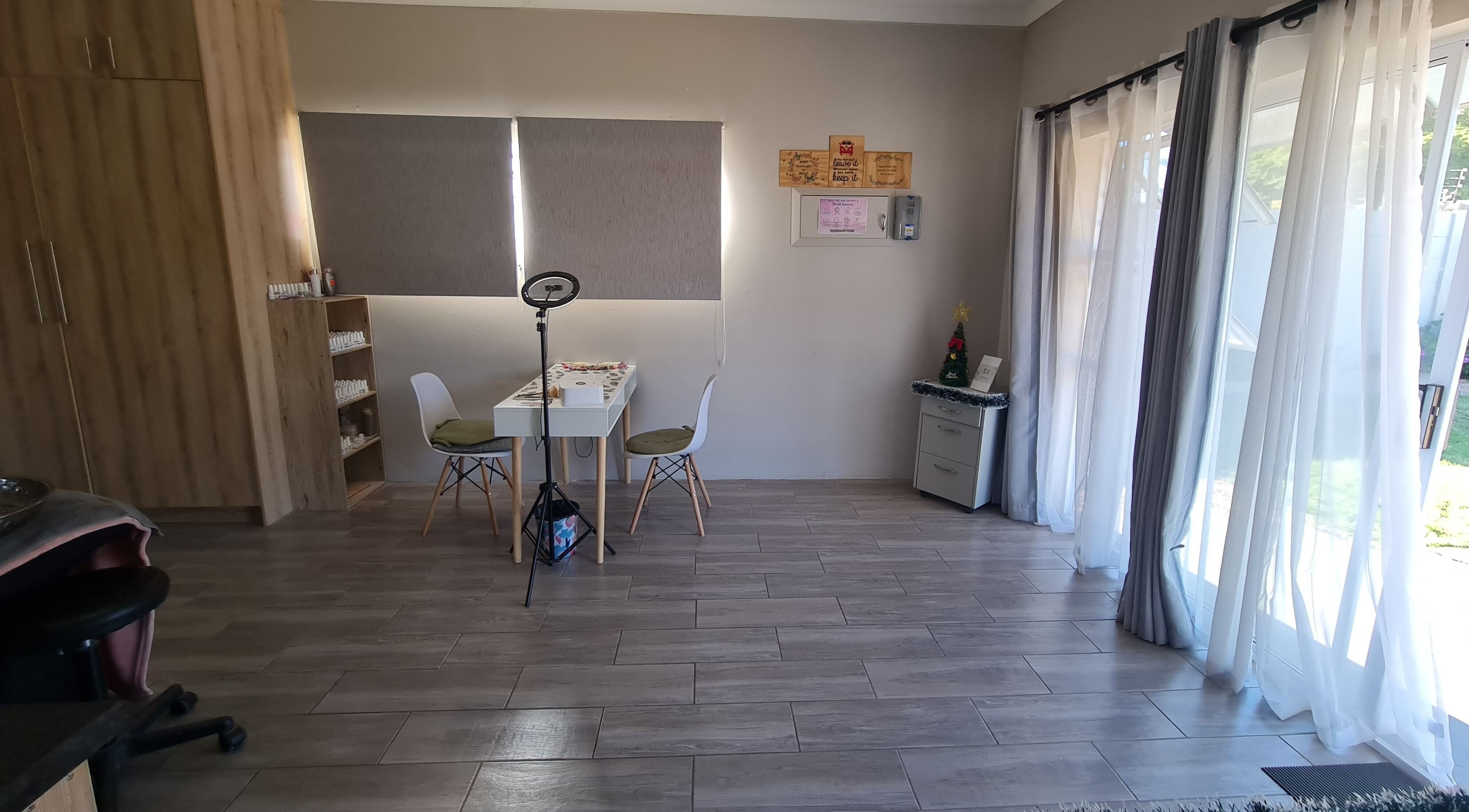 Bright beauty studio at Beauty Secrets, Jeffreys Bay, Eastern Cape, ZA, with elegant decor and ample natural light.