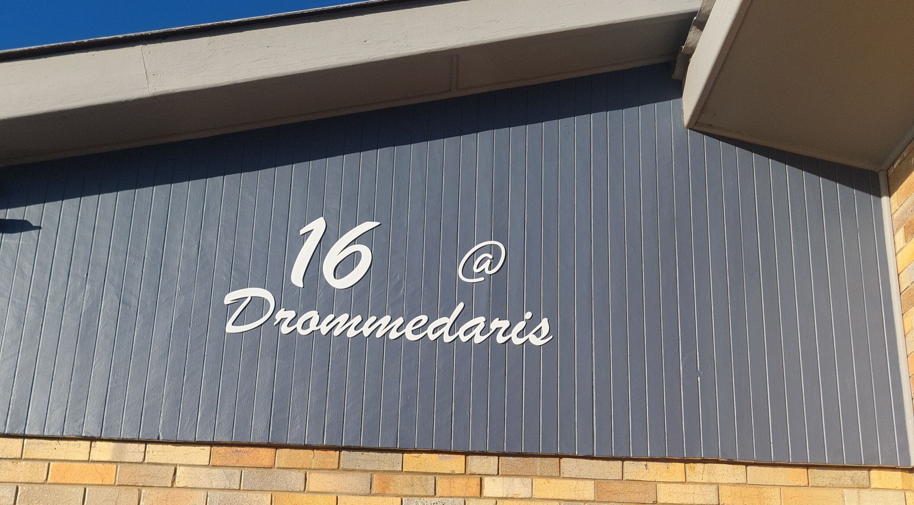 Exterior wall displaying unit 16 at Drommedaris, near Beauty Secrets, Jeffreys Bay, Eastern Cape, ZA.