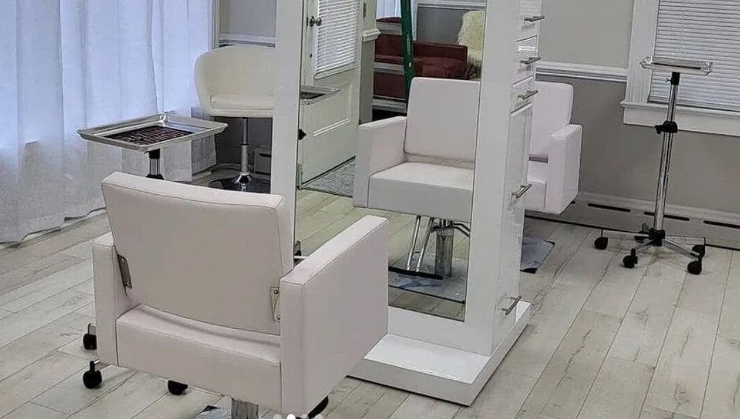 Modern salon chairs in JQ The Salon, Stanhope, New Jersey, providing a luxurious beauty experience.