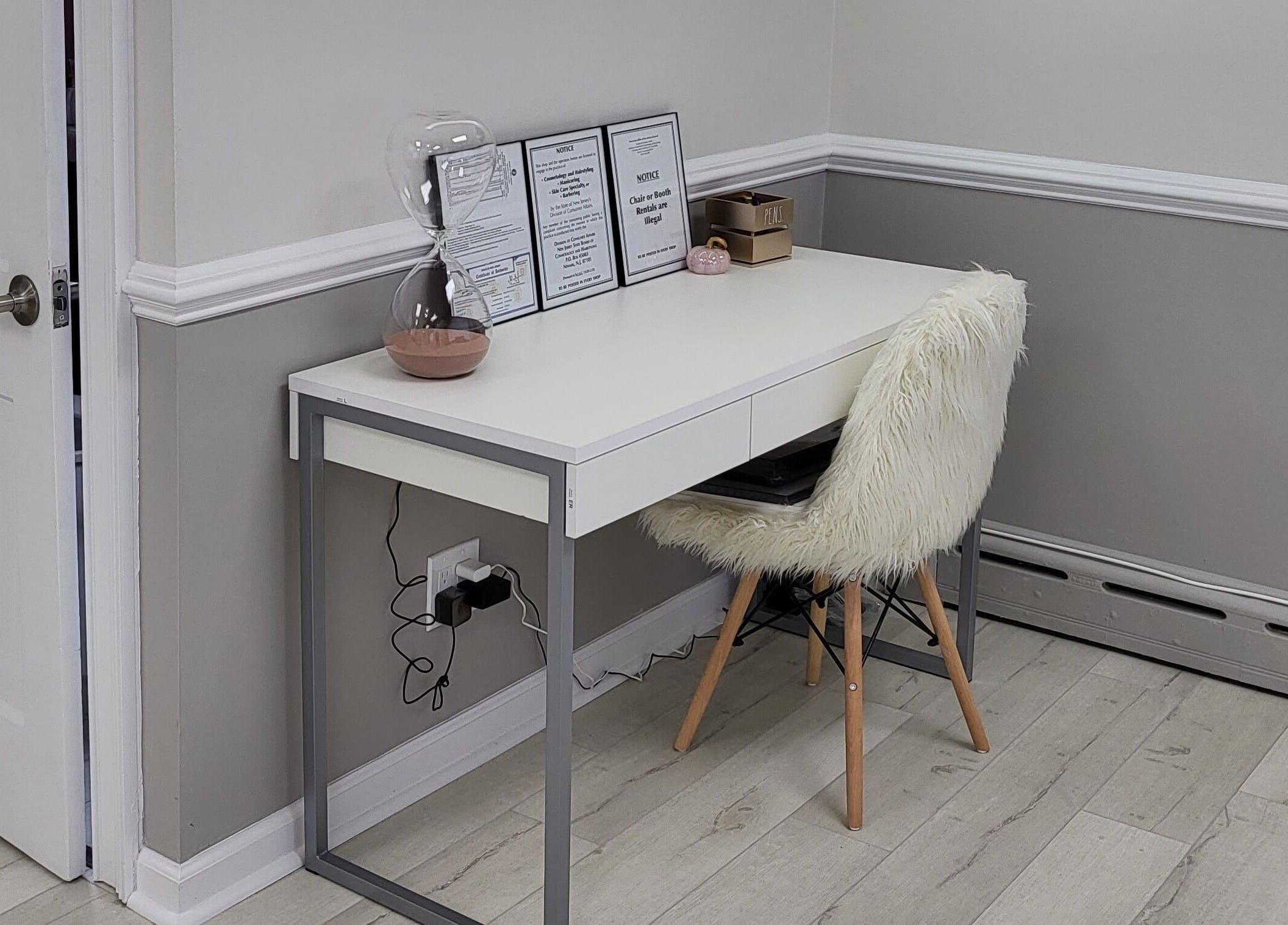 Modern desk at JQ The Salon, Stanhope, New Jersey, US, ideal for a serene beauty experience.