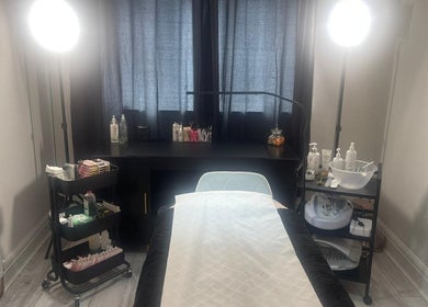 Calm treatment room at Klg Nails & Beauty, Tyldesley, England, GB, featuring a massage table and essential tools.