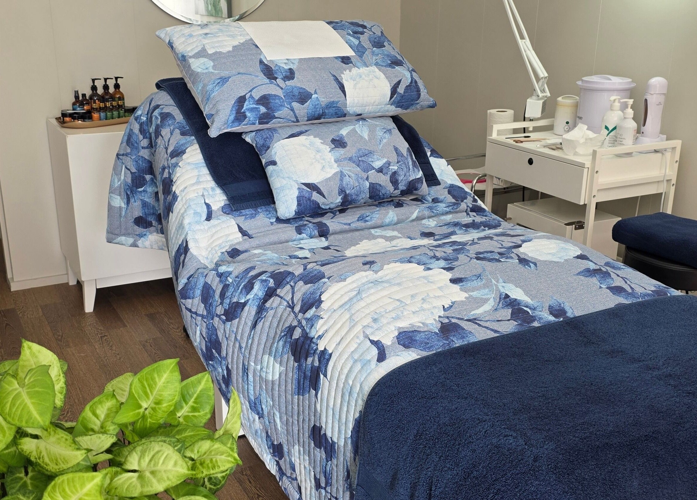 Comfortable floral treatment bed at Beauty by Tania in Auckland, Auckland, NZ with calming decor.