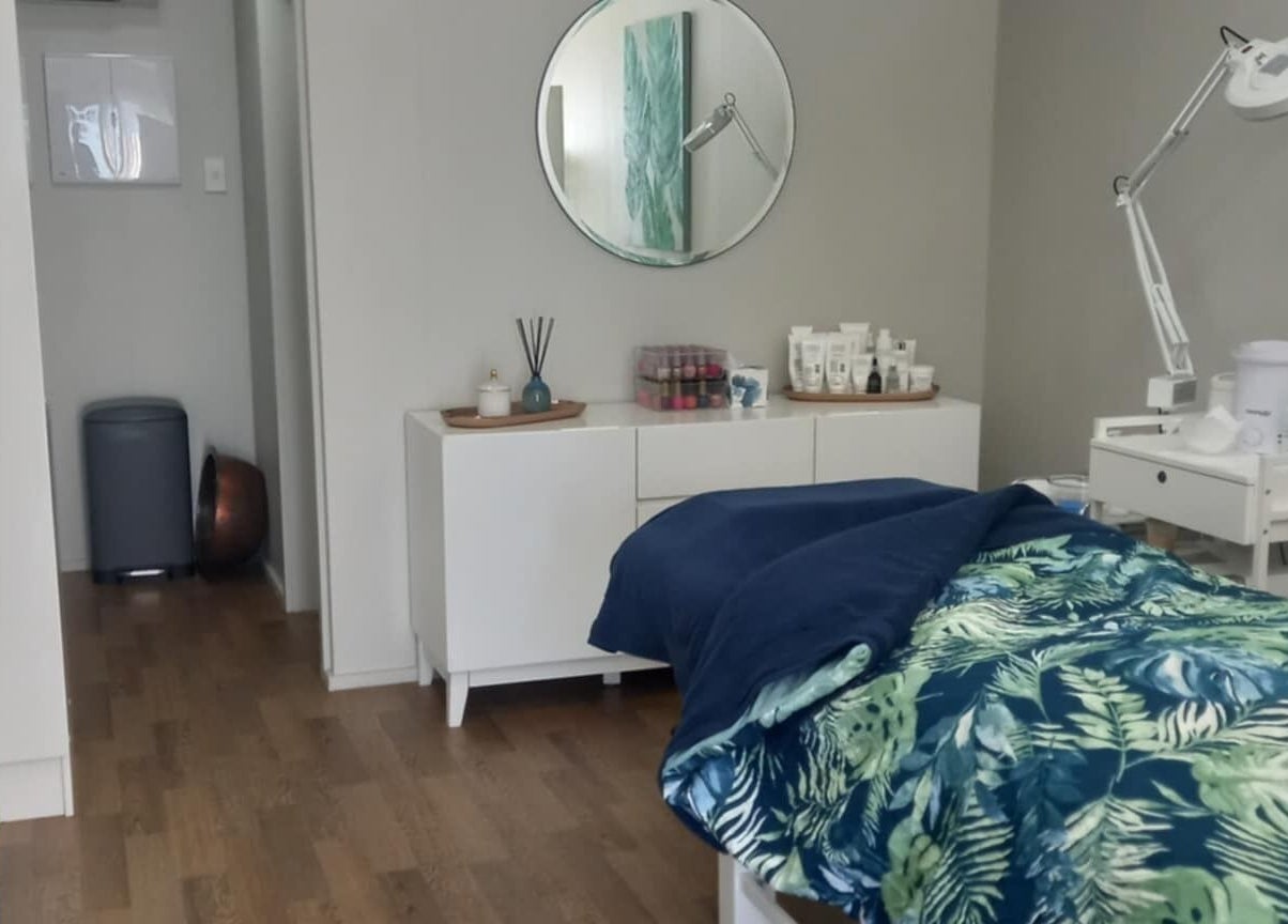 Peaceful treatment room at Beauty by Tania, Auckland, NZ showcasing a cozy and inviting decor.