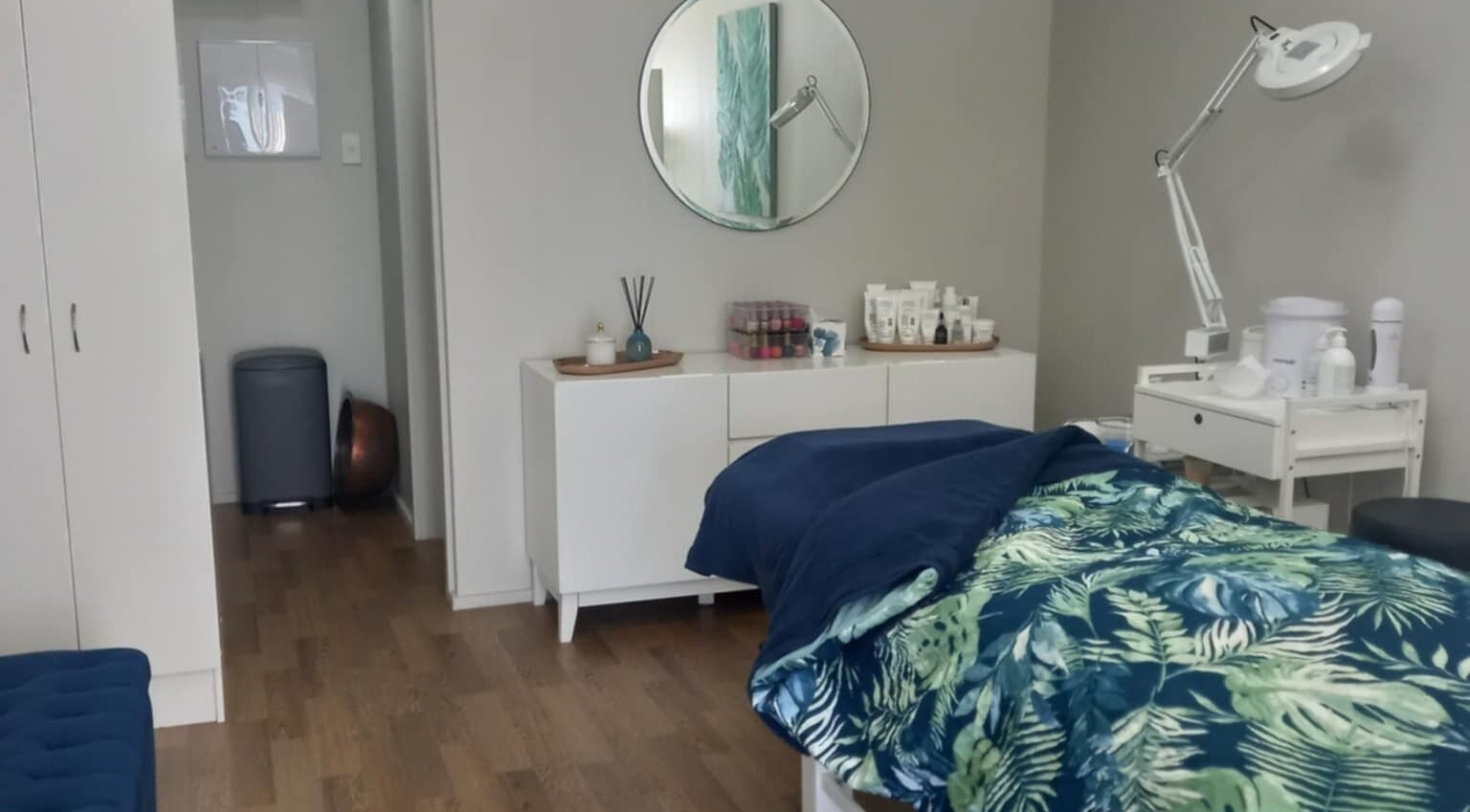 Peaceful treatment room at Beauty by Tania, Auckland, NZ showcasing a cozy and inviting decor.