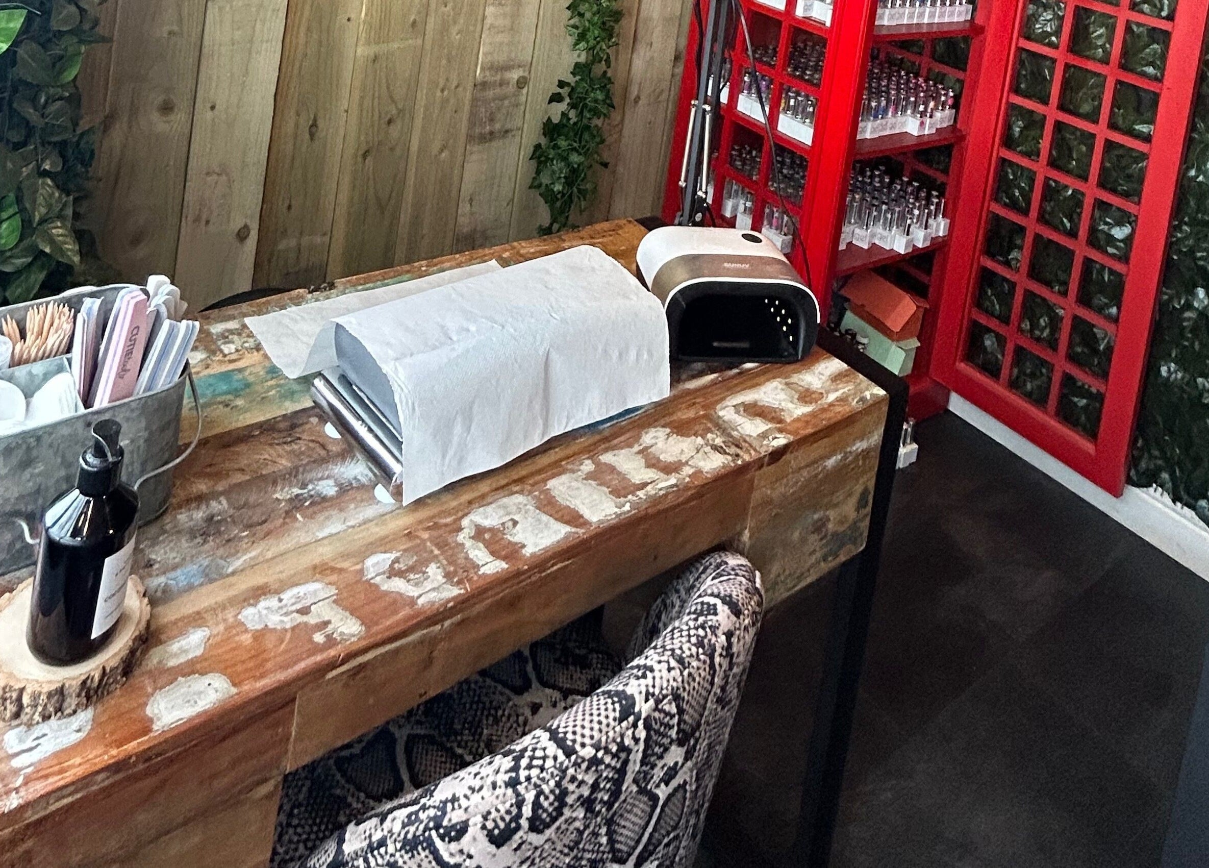 Rustic nail station at Lady Muck, Bilston, Scotland, GB with tools and decor.