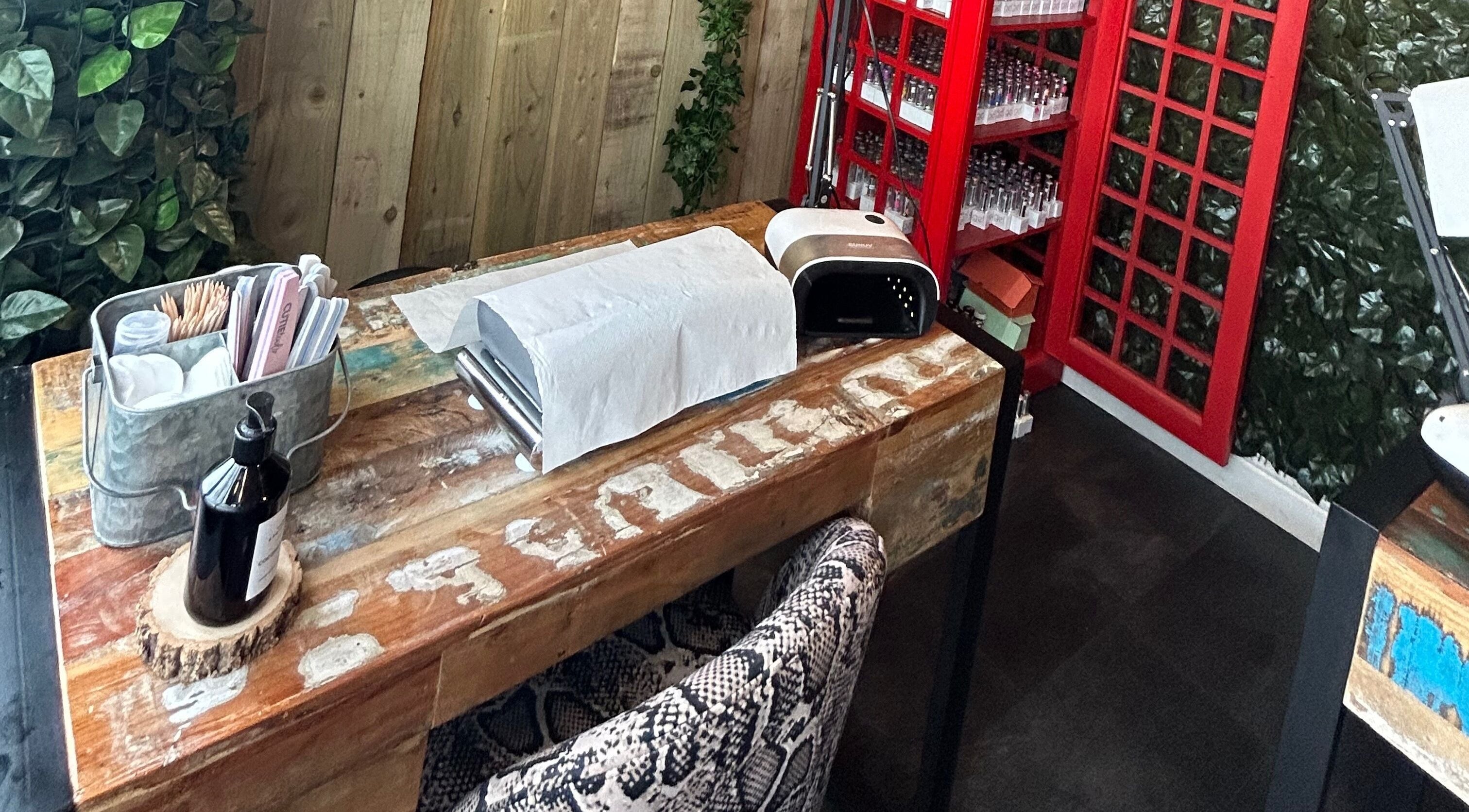 Rustic nail station at Lady Muck, Bilston, Scotland, GB with tools and decor.