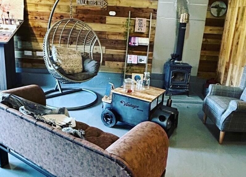 Cozy lounge at Lady Muck, Bilston featuring vintage decor and rustic elements in Bilston, Scotland, GB.
