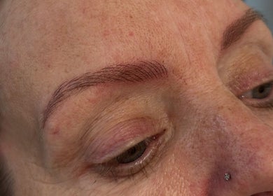 Microbladed eyebrows detail from SC Aesthetics in Ayr, Scotland, GB. Showcasing precision beauty work.