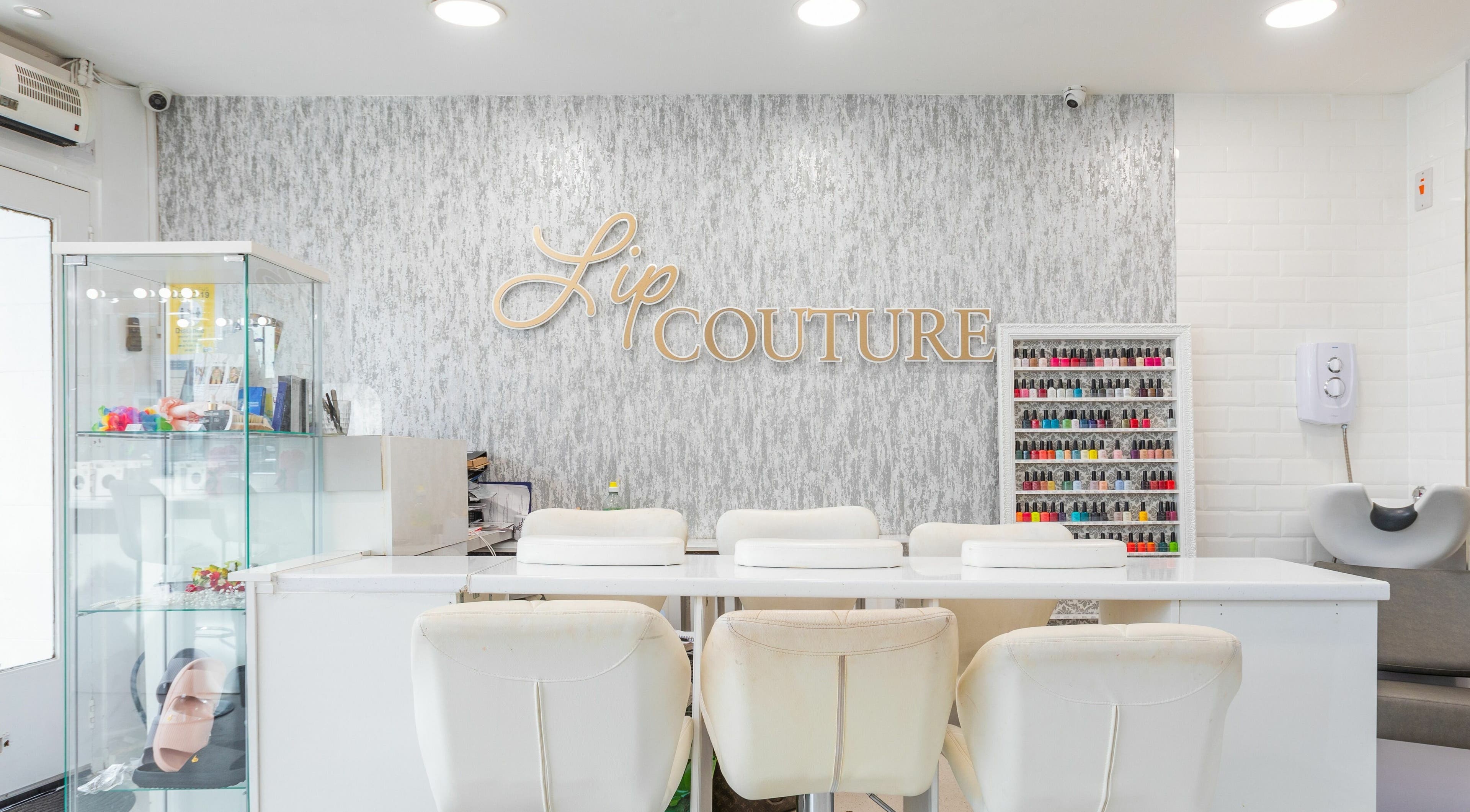 Sophisticated manicure station at Lipcouture, Waterloo, England, GB showcasing modern design and nail color display.