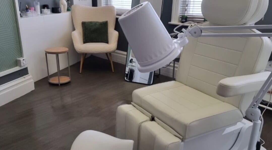 Elegant treatment room at Body & Sole Wellness Clinic in Nuneaton, England, GB, showcasing a comfortable white therapy chair.