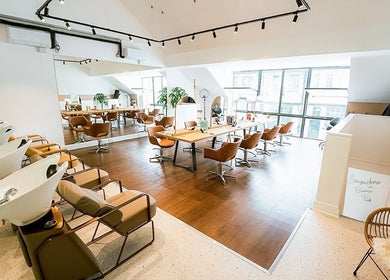 Contemporary salon interior at Somewhere in Queens Park, London, England, GB with chic styling areas.