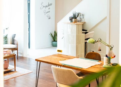 Cozy interior of Somewhere in Queens Park, London, England, GB with modern decor and natural light.