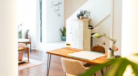 Cozy interior of Somewhere in Queens Park, London, England, GB with modern decor and natural light.