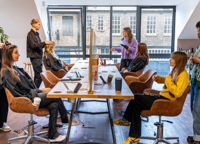 Stylists and clients in action at Somewhere in Queens Park, London, England, GB salon.