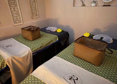 Cozy massage room at Remedy Thai Massage and Spa in Auckland, Auckland, NZ with two inviting treatment beds.