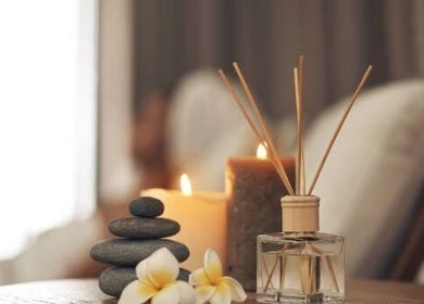 Relaxing spa ambiance at Remedy Thai Massage and Spa in Auckland, Auckland, NZ with candles and stones.