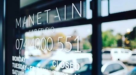 Manetain front glass with contact details, Pretoria, Gauteng, ZA.