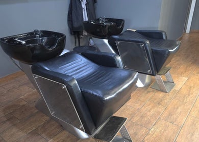 Modern salon wash stations at Manetain, Pretoria, Gauteng, ZA, showcasing comfort and style.