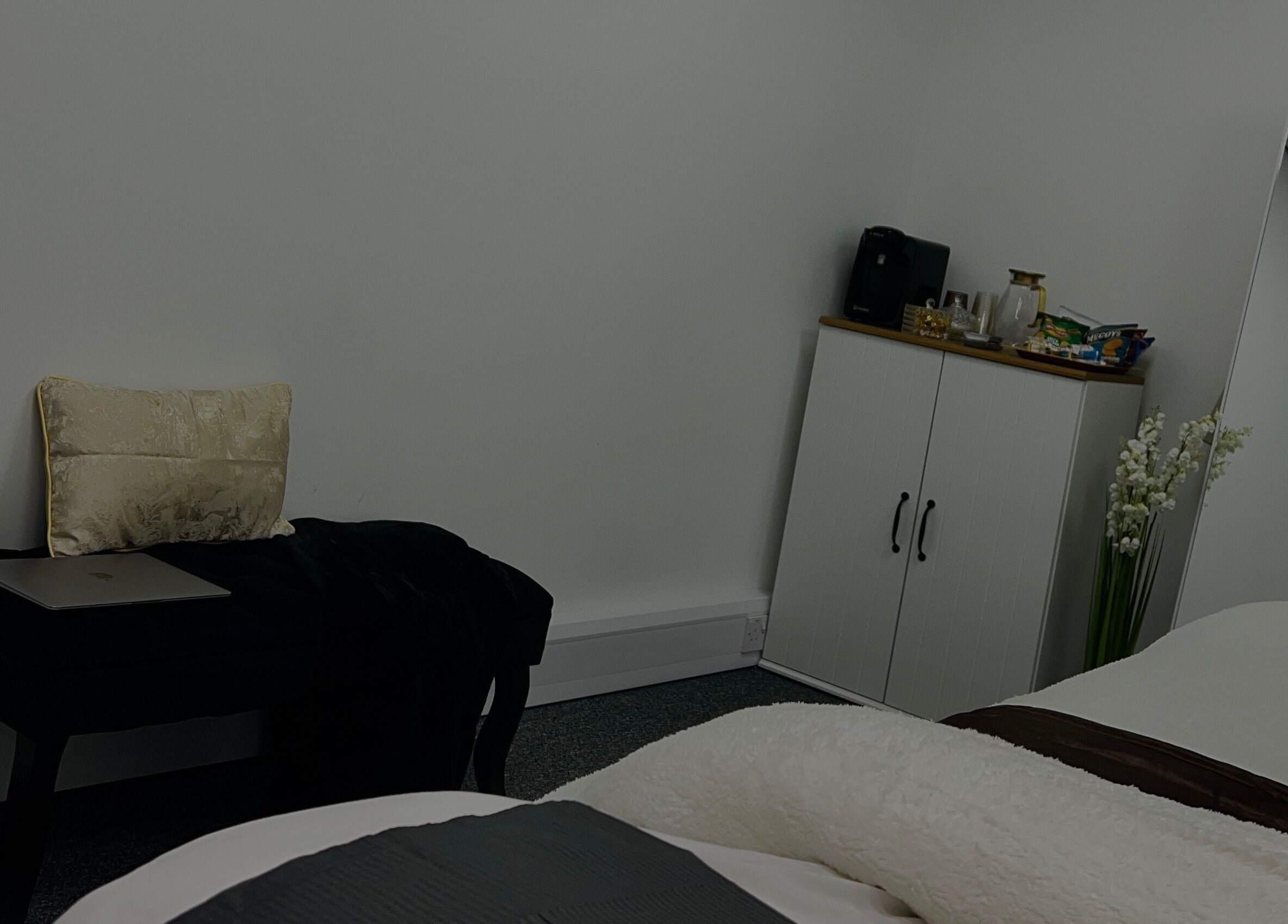 Elegant relaxation room at The K Way in Waltham Abbey, England, GB with plush seating and stylish decor.