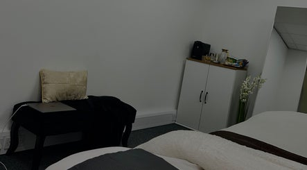 Elegant relaxation room at The K Way in Waltham Abbey, England, GB with plush seating and stylish decor.