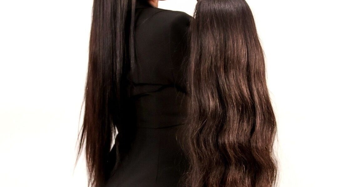 Professional hair styling at Rahella Beauty Bar in Kitchener, Ontario, CA, showcasing sleek and long hairstyles.