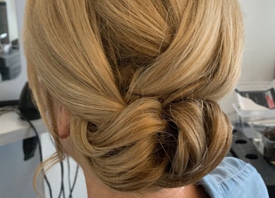Elegant updo hairstyle at Jenni Hair, Renfrewshire, Scotland, GB salon.