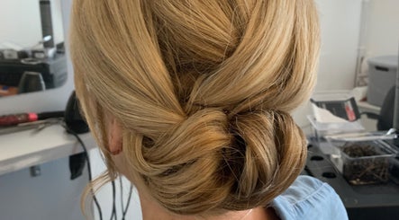 Elegant updo hairstyle at Jenni Hair, Renfrewshire, Scotland, GB salon.