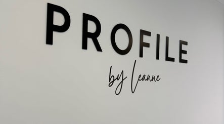 Profile by Leanne sign on a wall at Basingstoke, England, GB, showcasing sleek logo design.