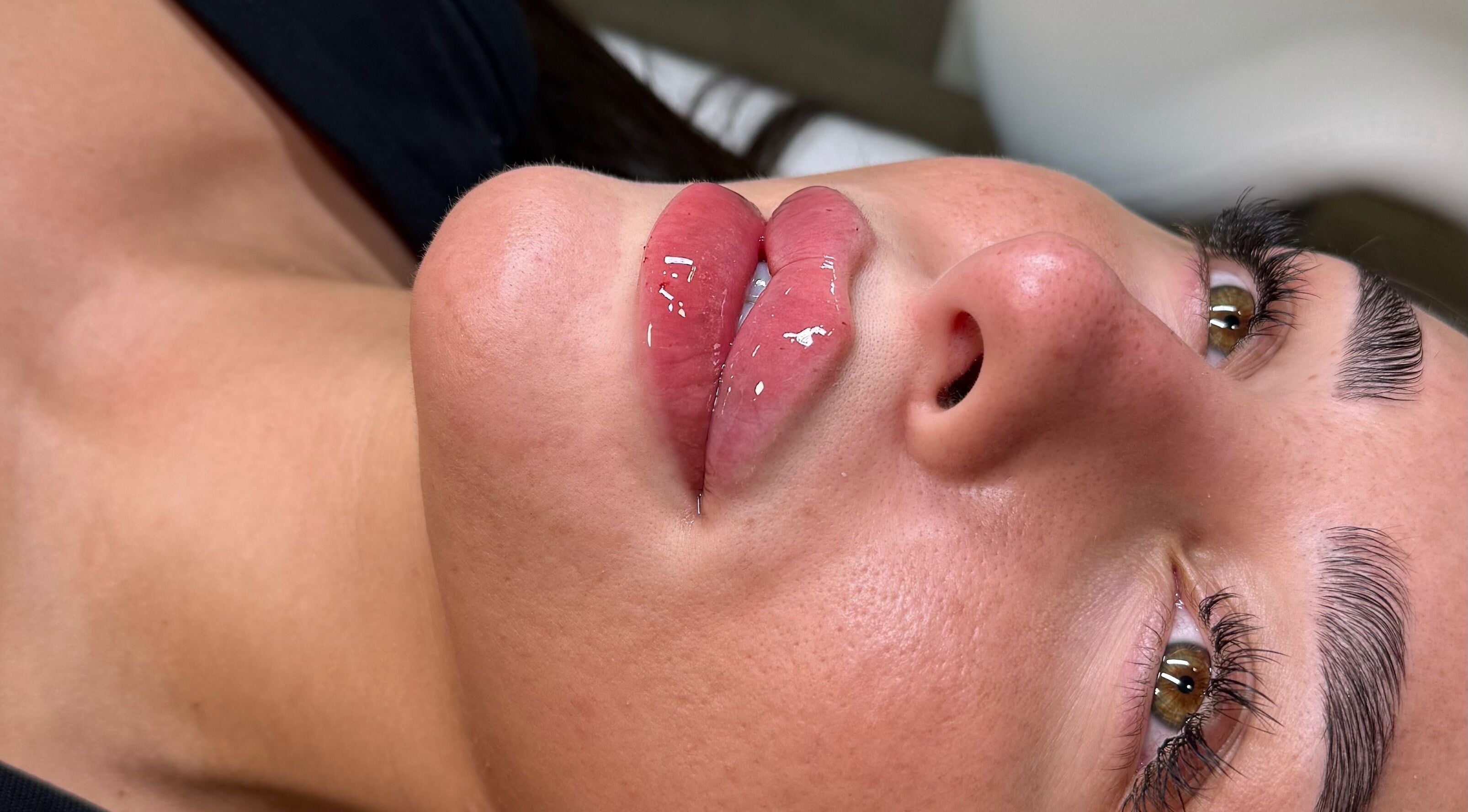 Glossy lip treatment at Profile by Leanne in Basingstoke, England, GB, showcasing a youthful and rejuvenated look.